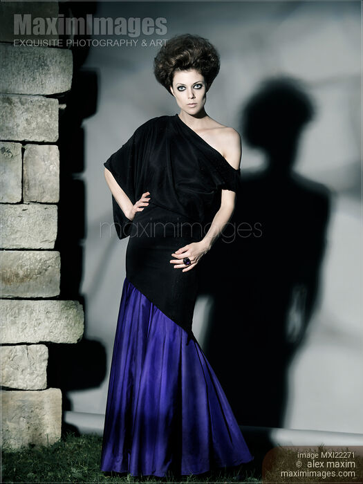 Beautiful Woman in Elegant Dress Stock photo of Beautiful Woman in Elegant Dress Buy commercial use license at MaximImages