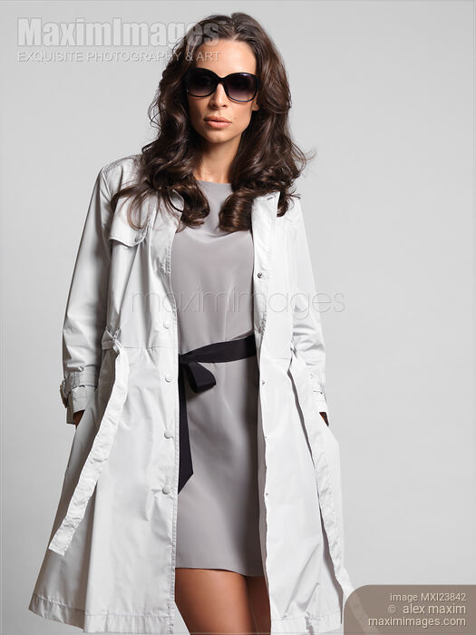 Beautiful Woman in Gray Trench Coat Stock photo of Beautiful Woman in Gray Trench Coat Buy commercial use license at MaximImages