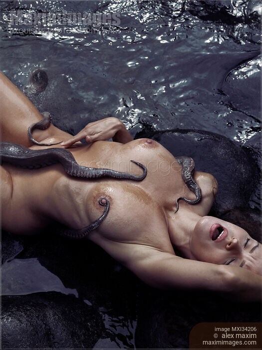 Beautiful woman making love to a giant octopus lying on sea shore with tentacles caressing her sensual nude body Stock photo of Beautiful woman making love to a giant octopus lying on sea shore with tentacles caressing her sensual nude body Buy commercial use license at MaximImages