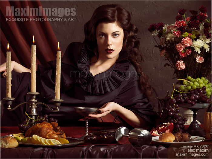 Beautiful Woman on a Festive Table Stock photo of Beautiful Woman on a Festive Table Buy commercial use license at MaximImages