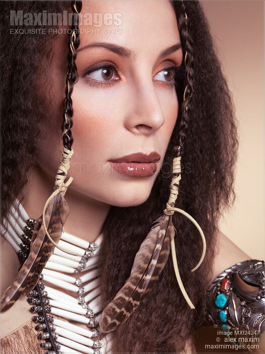 Beautiful woman wearing aboriginal accessories and jewelry Stock photo of Beautiful woman wearing aboriginal accessories and jewelry Buy commercial use license at MaximImages