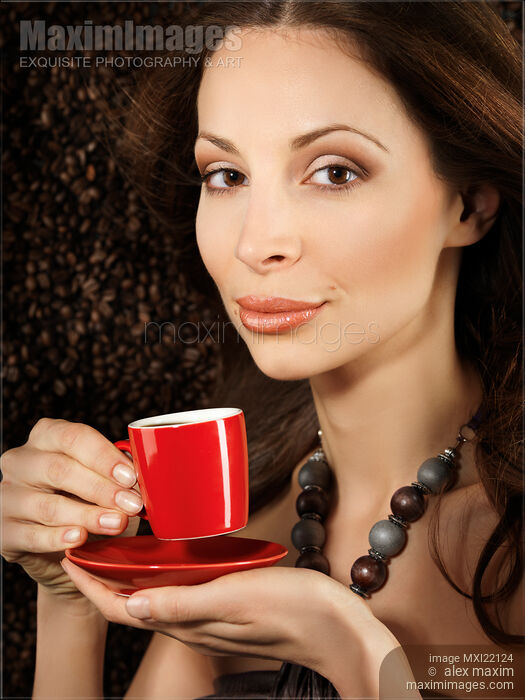 Beautiful Woman with a Cup of Coffee Stock photo of Beautiful Woman with a Cup of Coffee Buy commercial use license at MaximImages
