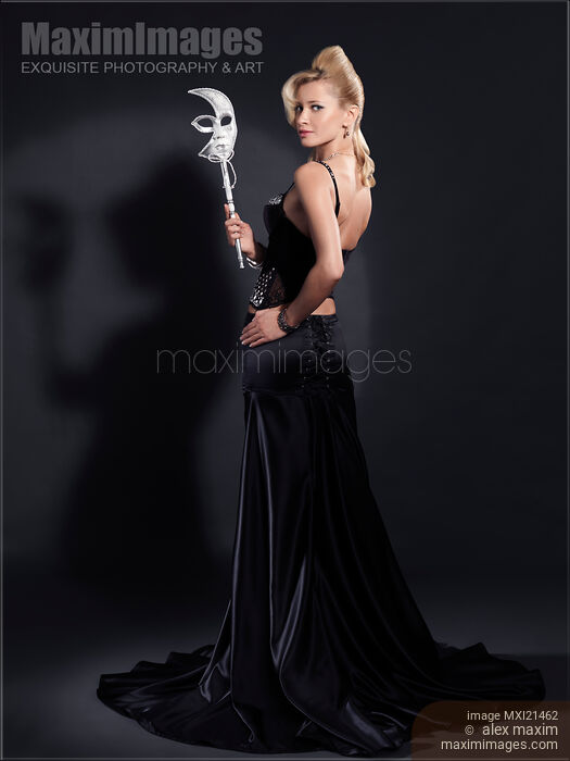 Beautiful Woman with a Venetian Mask Stock photo of Beautiful Woman with a Venetian Mask Buy commercial use license at MaximImages