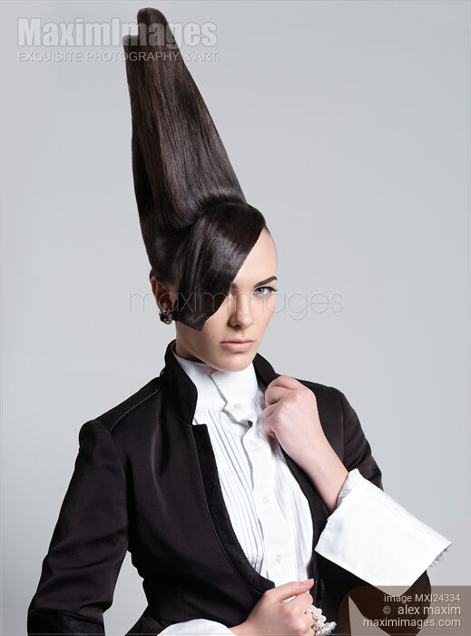 Beautiful Woman with Creative Tall Hairstyle Stock photo of Beautiful Woman with Creative Tall Hairstyle Buy commercial use license at MaximImages