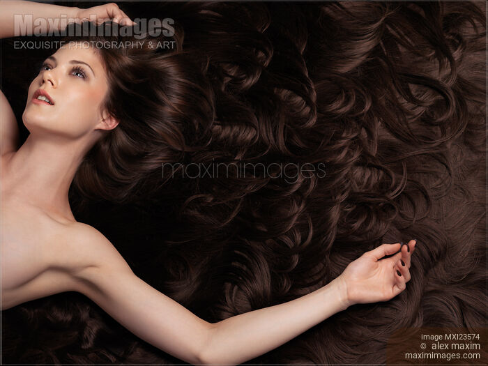 Stock photo of Beautiful Woman with Hair Extensions Buy commercial use license at MaximImages