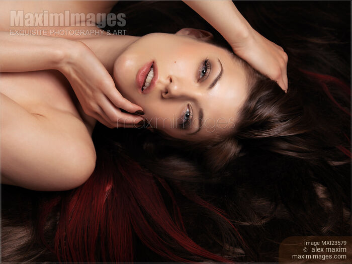 Stock photo of Beautiful Woman with Hair Extensions Buy commercial use license at MaximImages