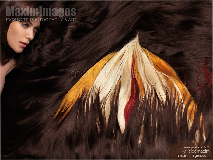 Stock photo of Beautiful Woman with Hair Extensions in a Shape of Fire Buy commercial use license at MaximImages