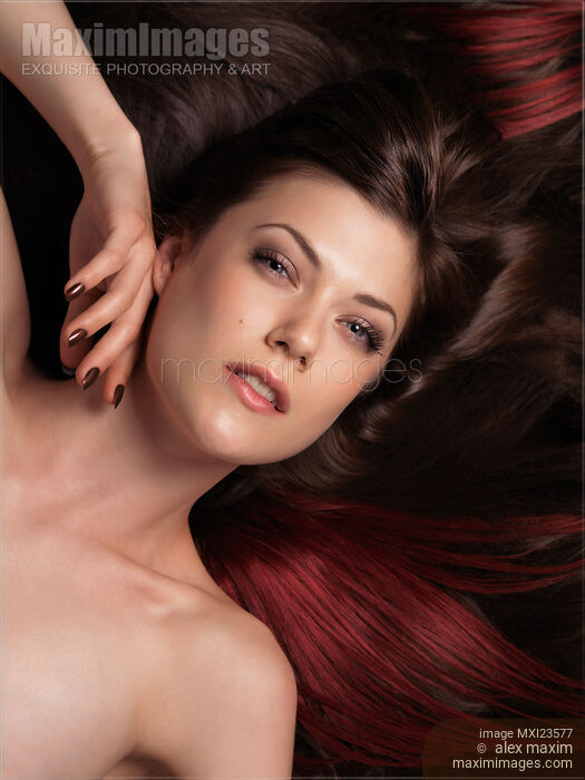Stock photo of Beautiful Woman with Long Hair Buy commercial use license at MaximImages