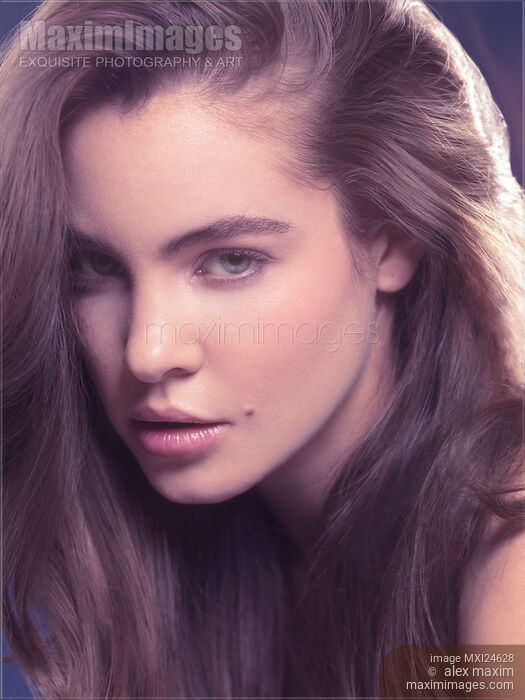 Beautiful woman with long light brown hair Stock photo of Beautiful woman with long light brown hair Buy commercial use license at MaximImages