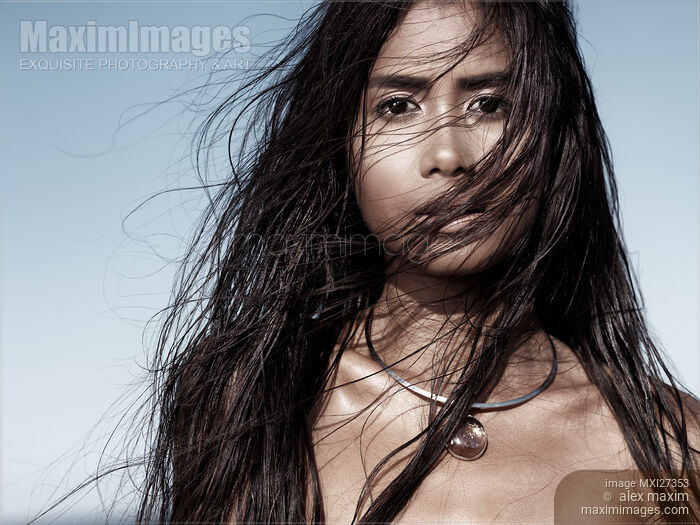 Beautiful woman with long wet hair artistic portrait