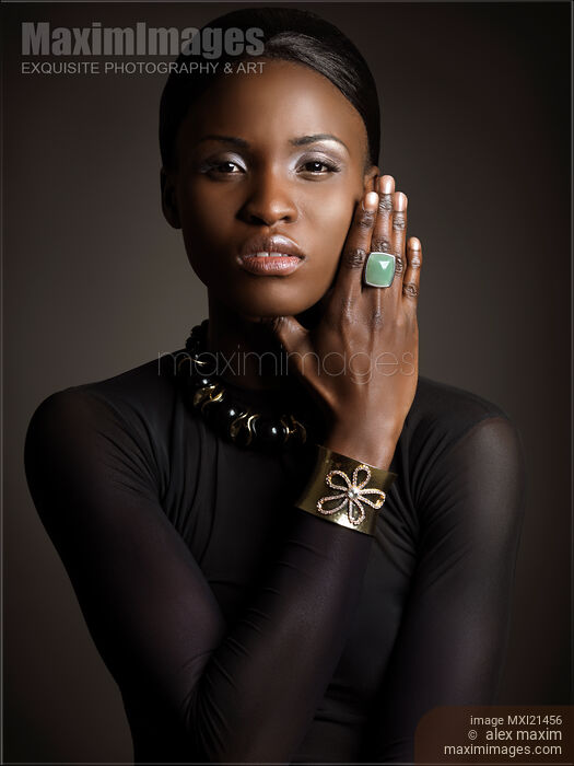 Stock photo of Beautiful Young Black Woman Beauty Portrait Buy commercial use license at MaximImages