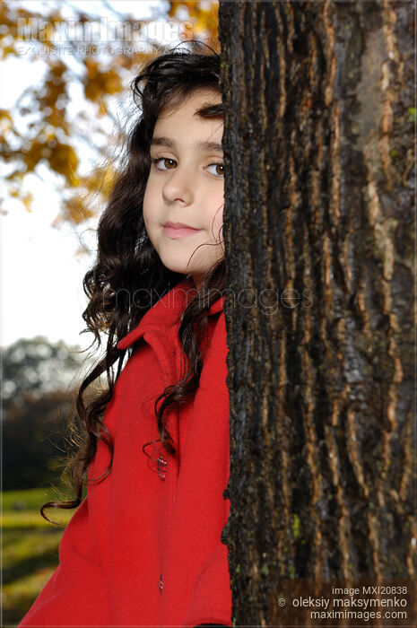 Stock photo of Beautiful Young Girl in Park Buy commercial use license at MaximImages