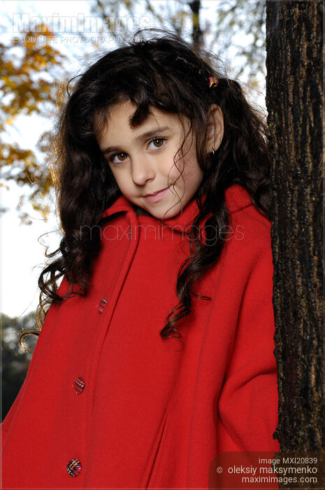 Stock photo of Beautiful Young Girl in Park Buy commercial use license at MaximImages