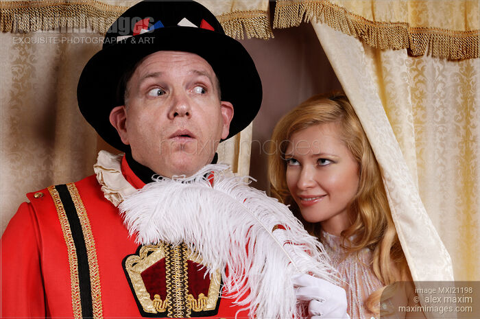 Stock photo of Beautiful Young Lady Distracting a Beefeater Buy commercial use license at MaximImages