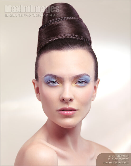 Beautiful Young Woman Portrait with Creative Hairstyle Stock photo of Beautiful Young Woman Portrait with Creative Hairstyle Buy commercial use license at MaximImages