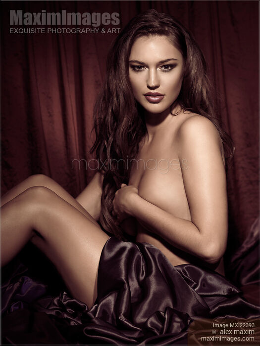 Beautiful Young Woman Sitting Naked in Bed Stock photo of Beautiful Young Woman Sitting Naked in Bed Buy commercial use license at MaximImages