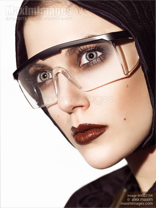 Beautiful Young Woman Wearing Eyeglasses Stock photo of Beautiful Young Woman Wearing Eyeglasses Buy commercial use license at MaximImages