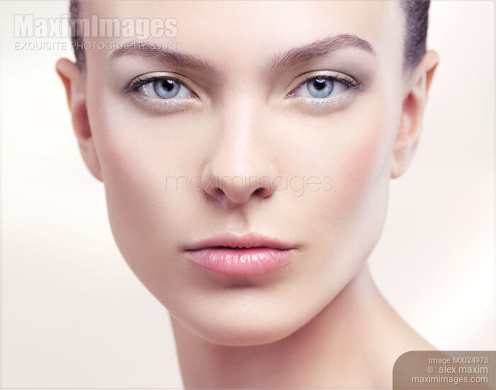 Beautiful young woman with clean skin closeup