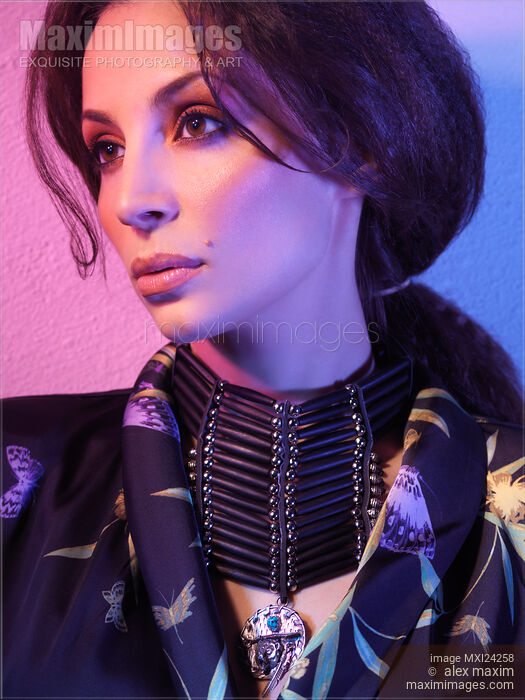Beauty portrait of a woman wearing a necklace Stock photo of Beauty portrait of a woman wearing a necklace Buy commercial use license at MaximImages