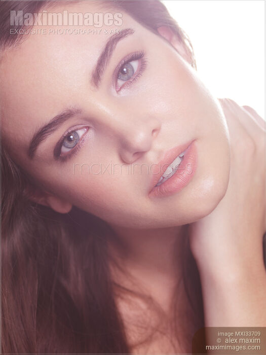 Stock photo of Beauty portrait of a woman with relaxed natural look, clean light skin and grey eyes Buy commercial use license at MaximImages