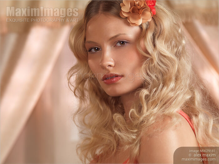 Beauty Portrait of a Young Woman with Beautiful Blond Hair Stock photo of Beauty Portrait of a Young Woman with Beautiful Blond Hair Buy commercial use license at MaximImages