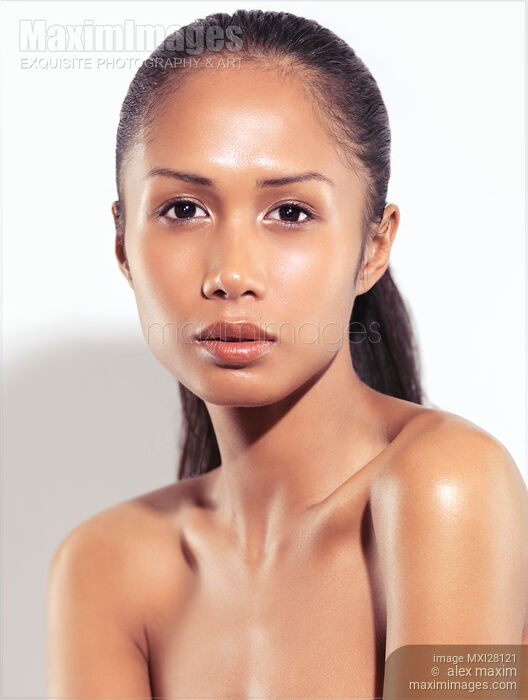 Beauty portrait of a young woman with natural look Stock photo of Beauty portrait of a young woman with natural look Buy commercial use license at MaximImages