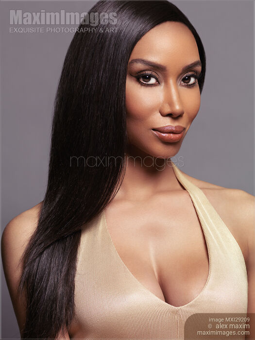 Beauty portrait of black woman face with long straight hair Stock photo of Beauty portrait of black woman face with long straight hair Buy commercial use license at MaximImages