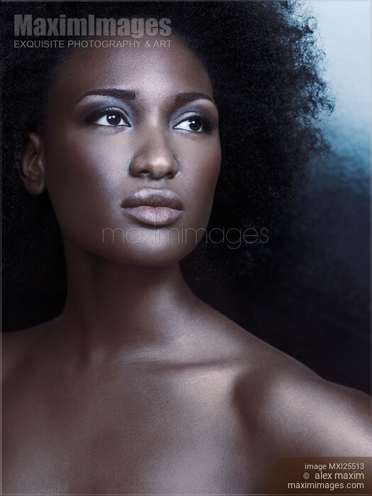 Beauty portrait of black woman with dark shiny metallic skin Stock photo of Beauty portrait of black woman with dark shiny metallic skin Buy commercial use license at MaximImages