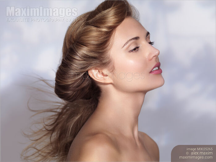 Beauty portrait of woman in tree shadow Stock photo of Beauty portrait of woman in tree shadow Buy commercial use license at MaximImages