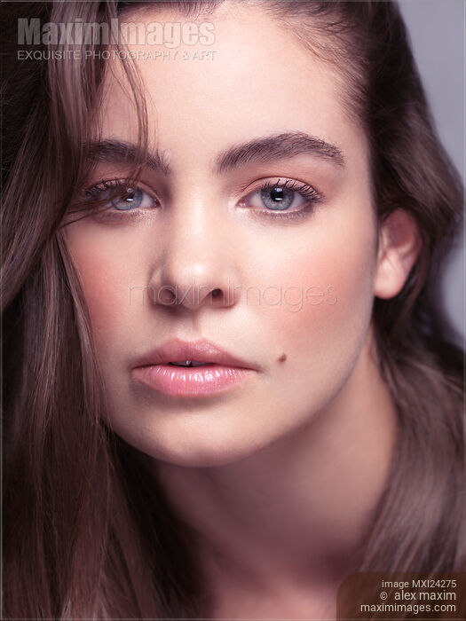 Beauty portrait of young woman with soft natural look Stock photo of Beauty portrait of young woman with soft natural look Buy commercial use license at MaximImages