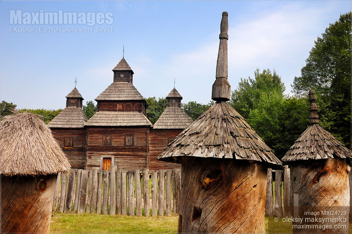 Bee Hives in front of historic Ukrainian church Stock photo of Bee Hives in front of historic Ukrainian church Buy commercial use license at MaximImages