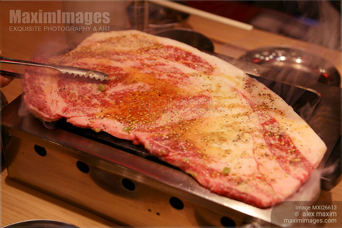 Stock photo of Beef cooked on grill at Japanese restaurant Buy commercial use license at MaximImages
