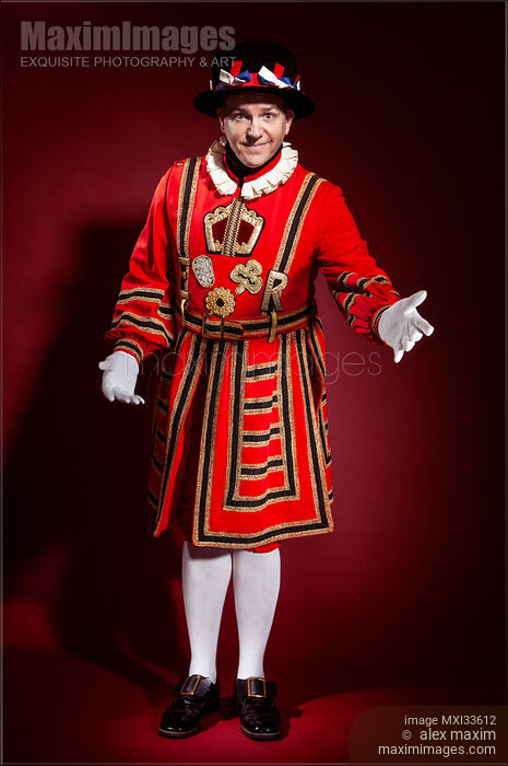 Stock photo of Beefeater Yeomen of the Guard Royal Yeoman Warder with welcoming gesture Buy commercial use license at MaximImages