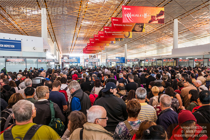 Beijing International Airport crowded with people Stock photo of Beijing International Airport crowded with people Buy commercial use license at MaximImages