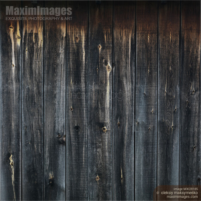 Stock photo of Black wooden boards wall texture Buy commercial use license at MaximImages