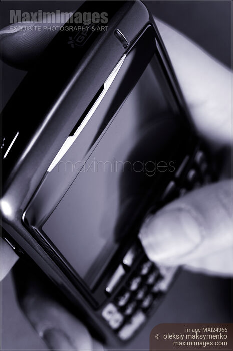 BlackBerry 8310 Curve phone in Hand Stock photo of BlackBerry 8310 Curve phone in Hand Buy commercial use license at MaximImages