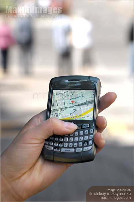 BlackBerry GPS Smartphone in a hand Stock photo of BlackBerry GPS Smartphone in a hand Buy commercial use license at MaximImages