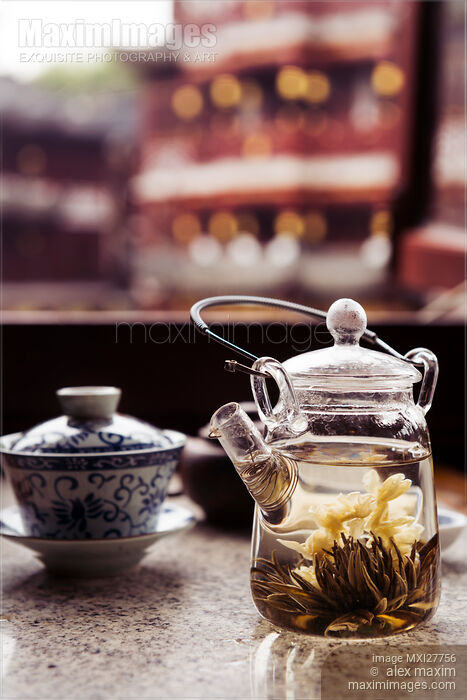 Blooming tea teapot at traditional tea house in Shanghai old town Stock photo of Blooming tea teapot at traditional tea house in Shanghai old town Buy commercial use license at MaximImages