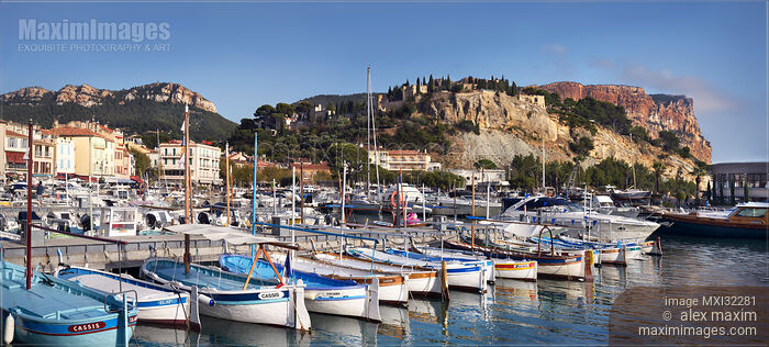 Stock photo of Boats in a quay of Cassis port town in Southern France Panoramic scenery Buy commercial use license at MaximImages