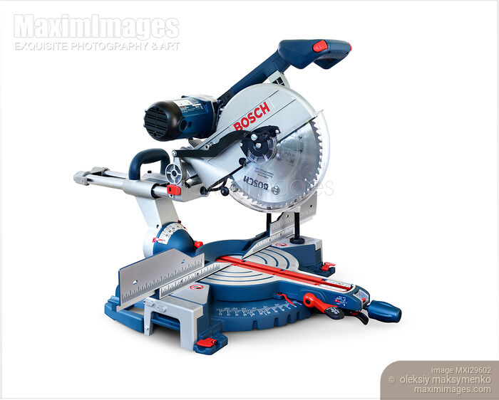 Stock photo of Bosch miter saw power tool isolated on white Buy commercial use license at MaximImages