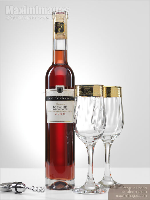 Stock photo of Bottle of Icewine and Two Wine Glasses Buy commercial use license at MaximImages