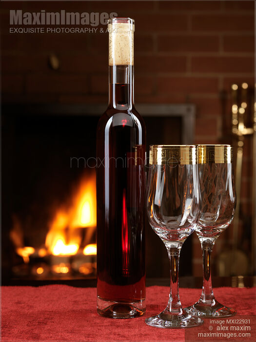 Stock photo of Bottle of Red Wine and Two Wine Glasses Buy commercial use license at MaximImages