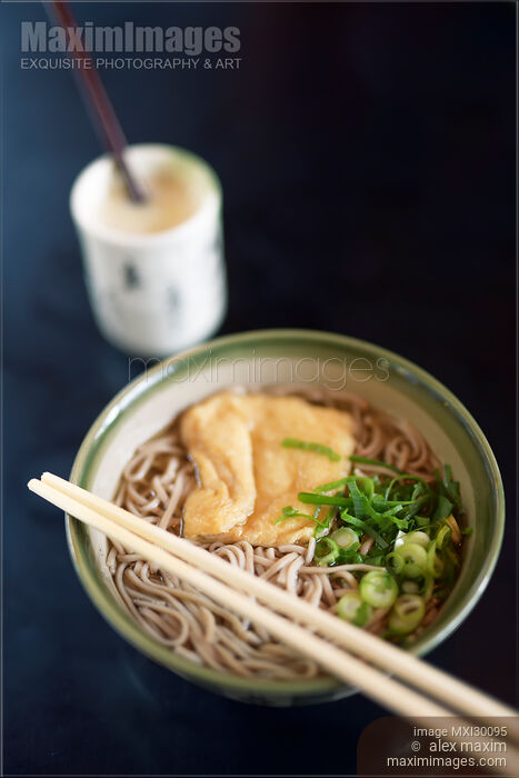 Bowl of ramen with soba noodles in Japanese restaurant Stock photo of Bowl of ramen with soba noodles in Japanese restaurant Buy commercial use license at MaximImages