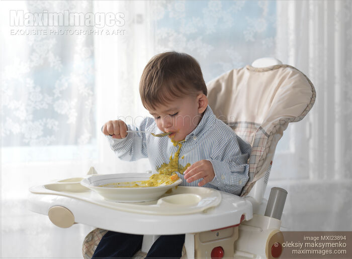 Stock photo of Boy Eating Soup Buy commercial use license at MaximImages