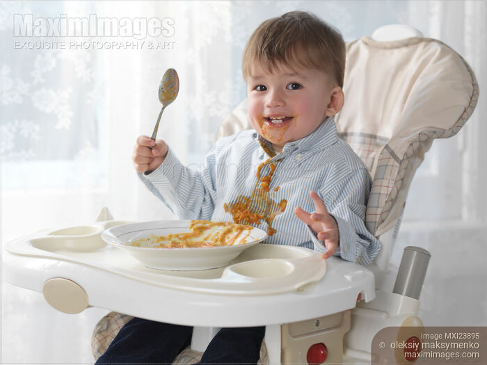 Stock photo of Boy Eating Soup Buy commercial use license at MaximImages