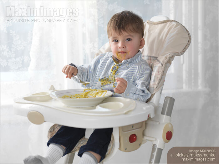 Stock photo of Boy Eating Soup Buy commercial use license at MaximImages