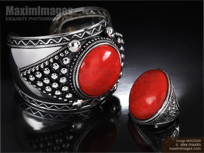 Stock photo of Bracelet and Ring with Red Stones Buy commercial use license at MaximImages