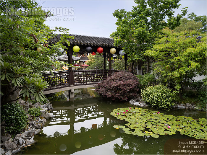 Stock photo of Bridge over a pond at Lan Su Chinese Garden in Portland Oregon Buy commercial use license at MaximImages