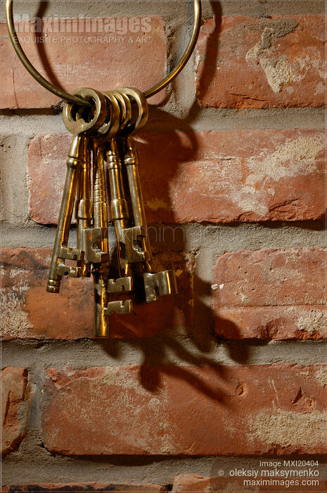 Bunch of antique keys on brick wall Stock photo of Bunch of antique keys on brick wall Buy commercial use license at MaximImages