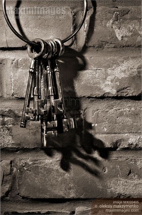 Bunch of antique keys on brick wall black and white Stock photo of Bunch of antique keys on brick wall black and white Buy commercial use license at MaximImages